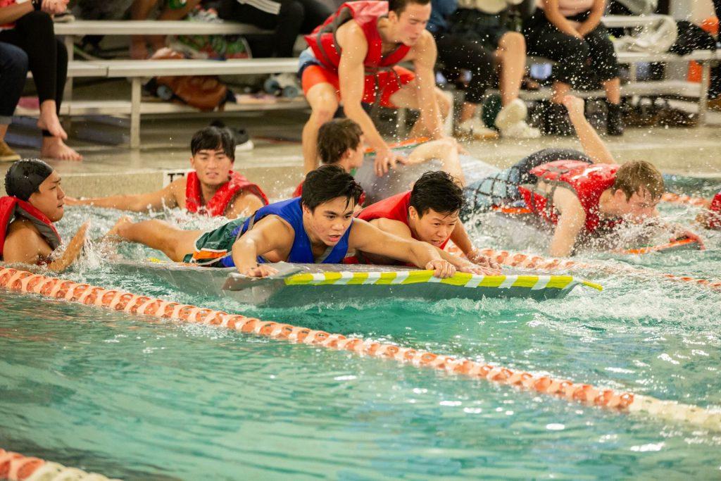 Photo of students competing in the Cardboard Boat Regatta